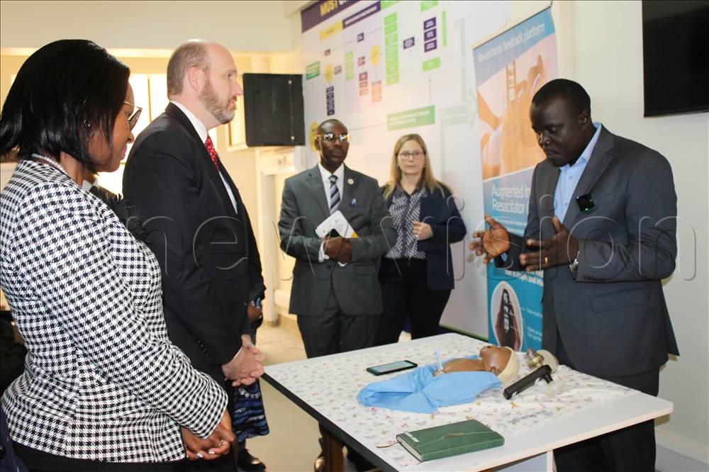 The US ambassador in Uganda William W Popp touring a number of projects supported by US government at Mbarara University.