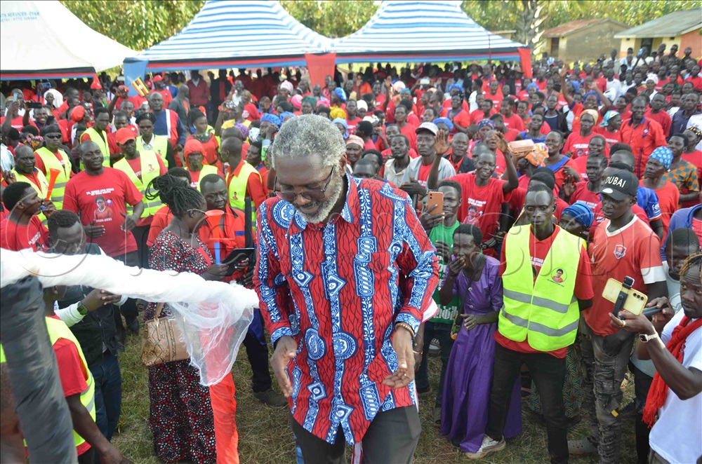 Akena walking to the stage at Acaba sub county in Oyam to campaign for Dr Apio on Thursday.