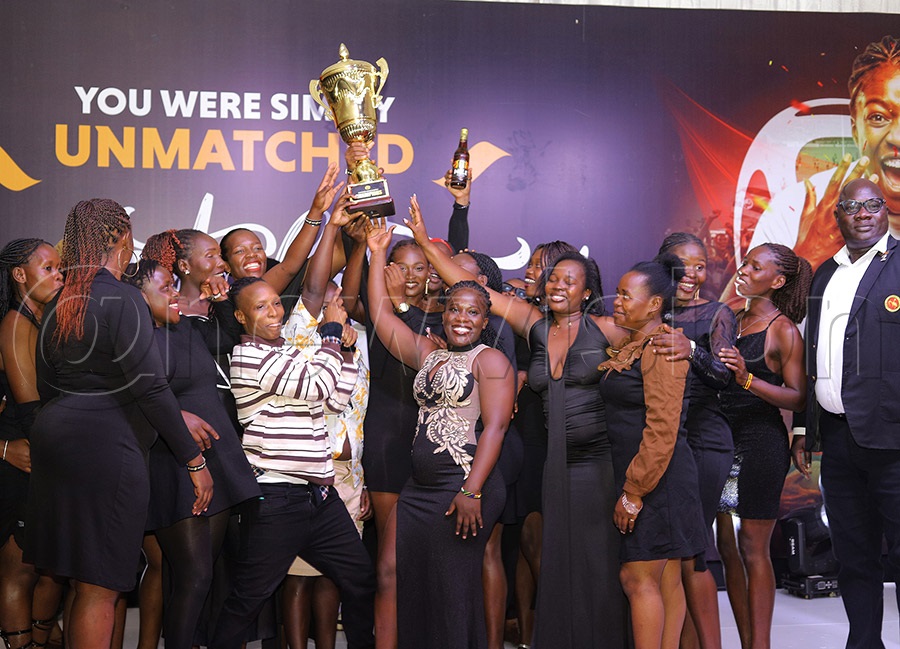 The Thunderbirds team celebrates with the League trophy at their awards dinner at Kyadondo. PHOTOS:Johnson Were