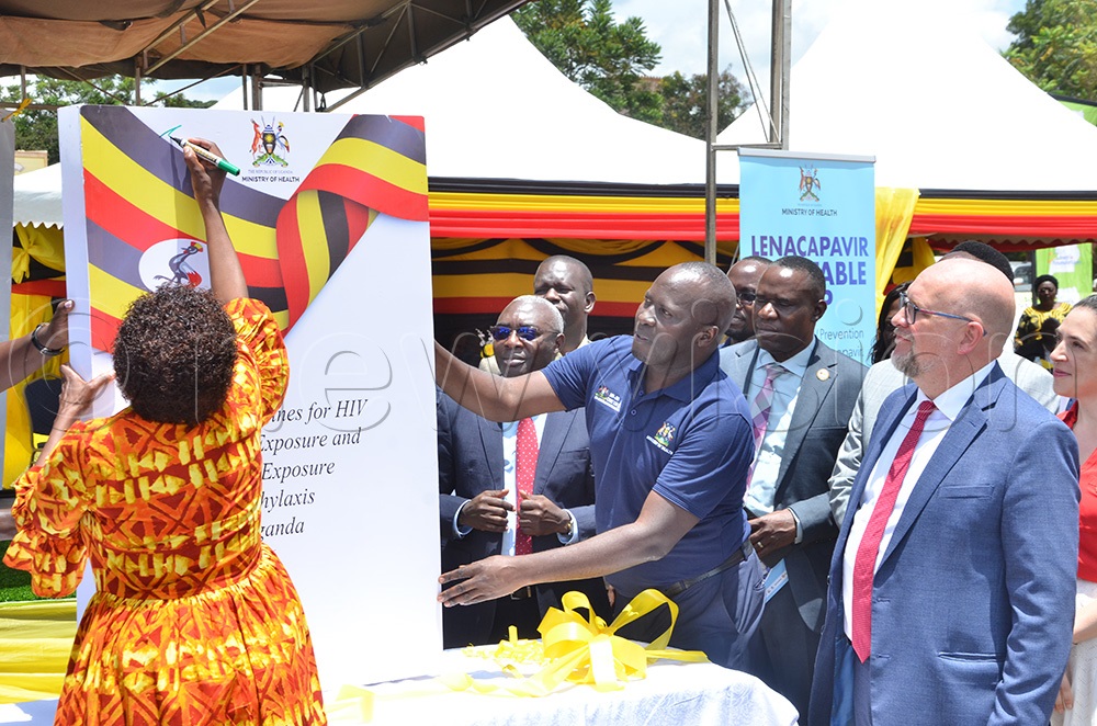 Health Minister Dr Jane Ruth Aceng signing the policy framwork for the use of the lenacapavir drug in Uganda. (Photo by Joseph Ekol)