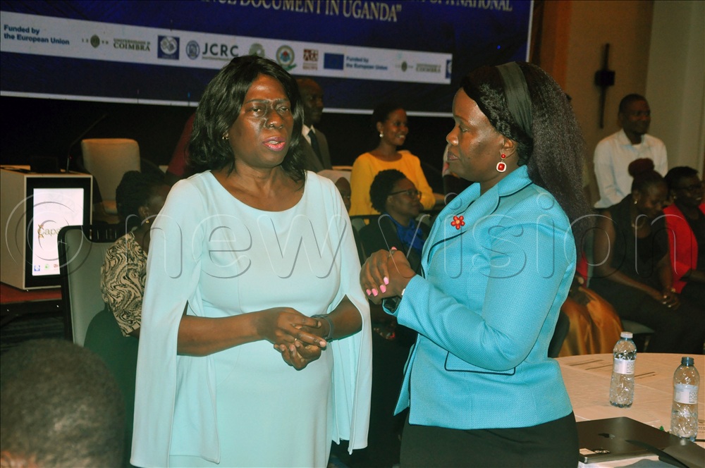 Mutuluuza (Left), the executive director of the Joint Clinical Research Centre (JCRC) and Nakazibwe (Right), team lead at the Pathogen Economy Office in the Office of the Presidentdiscussing at Protea Hotel. This was during the dissemination of findings of a study titled ‘Assessing knowledge and perceptions on gene therapy use towards the establishment of a national regulatory guidance document in Uganda’. 