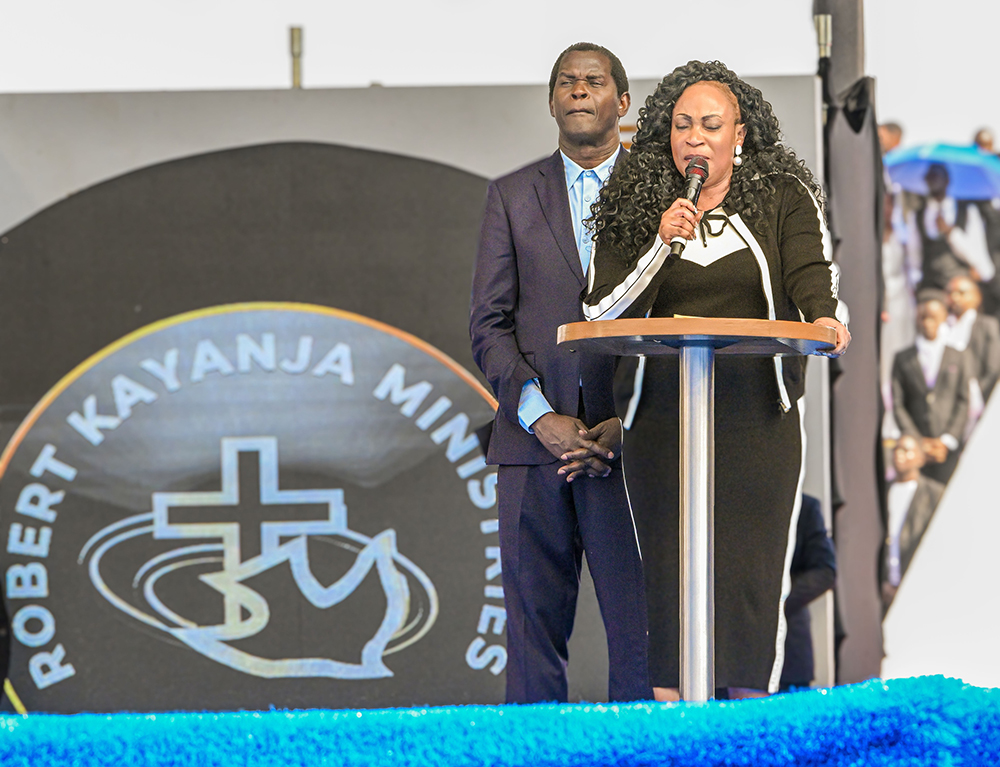 Pastor Jessica Kayanja speaks during the conference as Pastor Robert Kayanja looks on. (PPU)