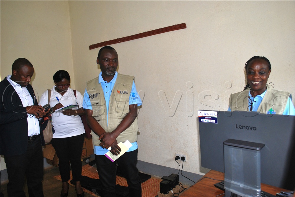 A health worker at St Francis Kijaguzo Health Centre III in Nakaseke District in the records office.