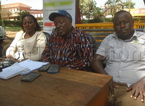 ULC commissioner Kasenge (middle) with other ULC officers address the media after a meeting with stakeholders in Jinja. (Credit: Charles Kakamwa)