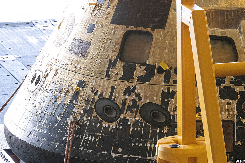 The NASA ORION capsule named “Integrity” showing scarring burns from the heat of re-entry arrives in to the Port of San Diego in San Diego, California, on April 11, 2026