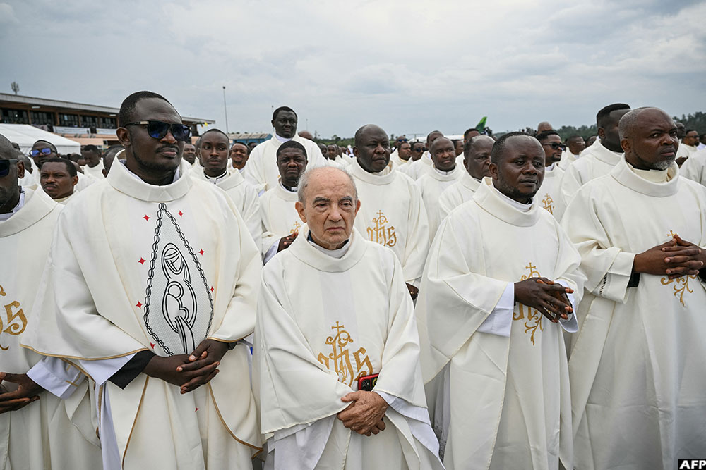  Priests listen as Pope Leo XIV leads the Holy Mass in Bamenda