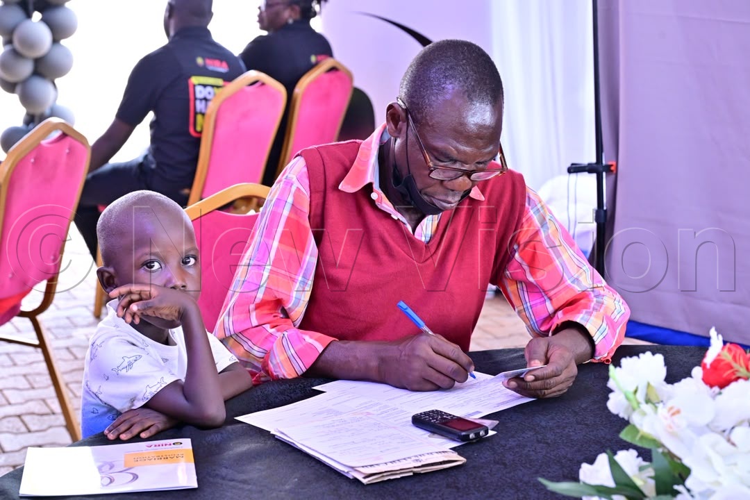 Kisembo explained that being registered as a child does not automatically mean that one has been issued a national identity card. (All Photos by Ponsiano Nsimbi & Miriam Namutebi)