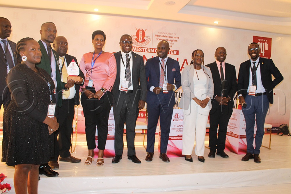 Ruharo Mission Hospital staff led by their hospital director, Dr Bekson Tayebwa receiving their award. (Photo by Abdulkarim Ssengendo)