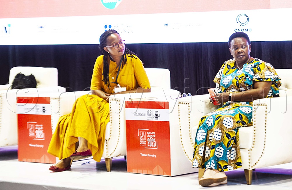 Sheila Akwany (L) and Goretti Kyomuhendo at the opening ceremony of the 2025 Kampala Writes LitFest inside the Yusuf Lule Auditorium, Makerere University on August 15th, 2025. (Photo by Kalungi Kabuye)