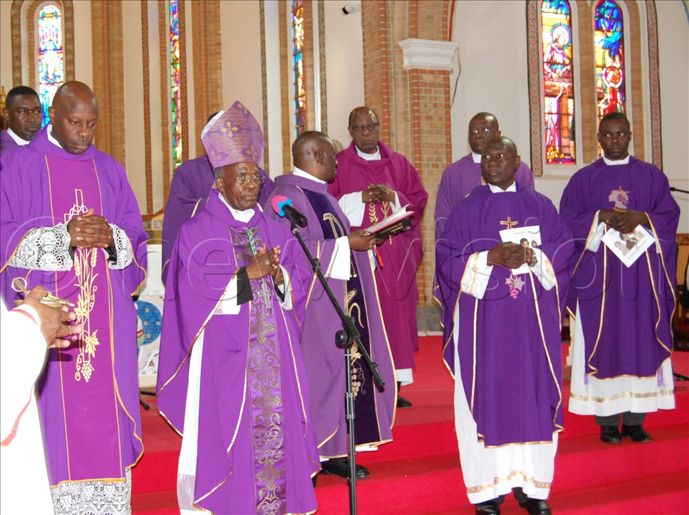 Archbishop AUgustine Kasujja (wearing a mitre) and Msgr. Rogers Kabuye Mukasa laying a wreath on the casket bearing the remains of Hon. Geraldine Namirembe Bitamazire during the requiem mass at Lubaga Cathedral on Tuesday, January 20, 2026.