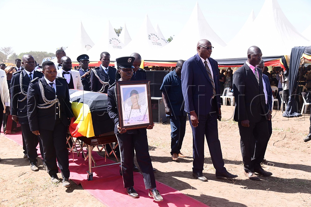Simon Peter Emiau, the general superintendent of PAG church in Uganda, and other church leaders leading as police rolled the body to the ground. (Credit: Godfrey Ojore)