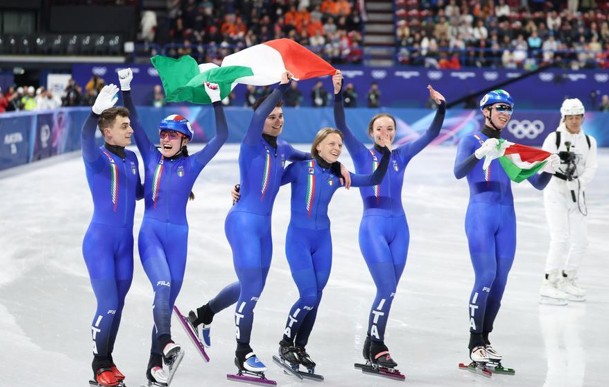 Qi (front) takes a selfie with Italy's short track athletes during the Milan-Cortina 2026 opening ceremony, February 6, 2026. (Photo credit to Qi)