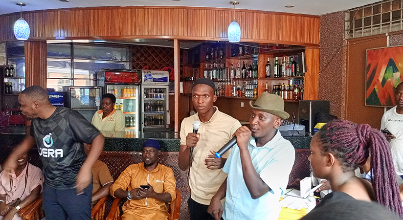 Some of the traders expressing dissatisfaction during the meeting that was called by UATEA to forge a way forward following the increase of rent by their landlords. (Photo by Moses Kigongo)