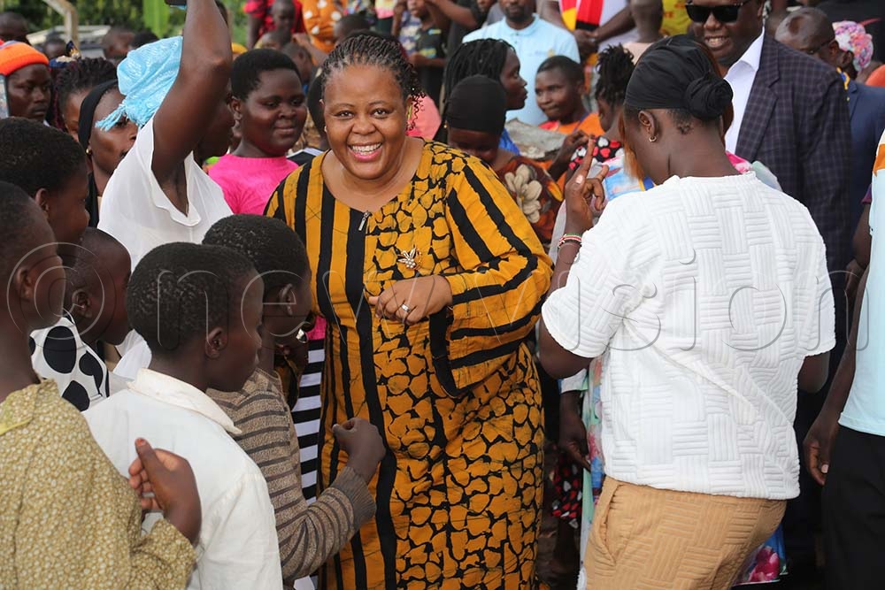 Jubilant residents of Bunapongo village in Mbale district being joined by their Woman MP, Miriam Mukhaye Wanyiaye. (Credit: Javier Silas Omagor)