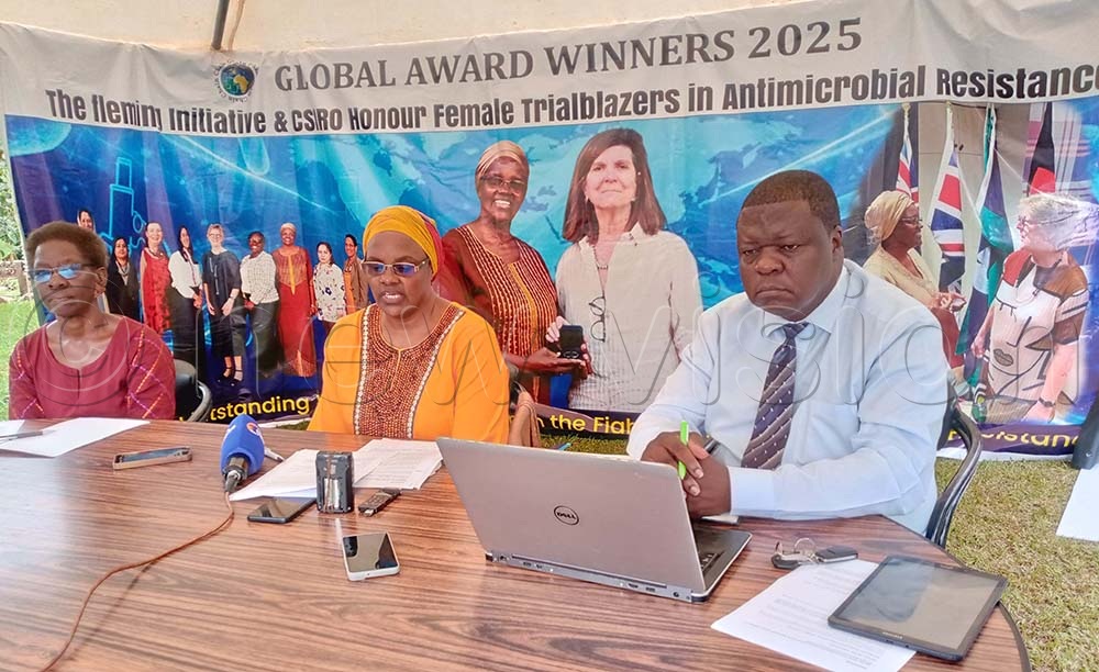 Regina Kamoga, the Executive Director of the Community Health and Information Network (C) speaking during a press conference as Gladys Nalukenge Program Manager and Dr Nathan Muyinda look on. (Credit: Violet Nabatanzi)