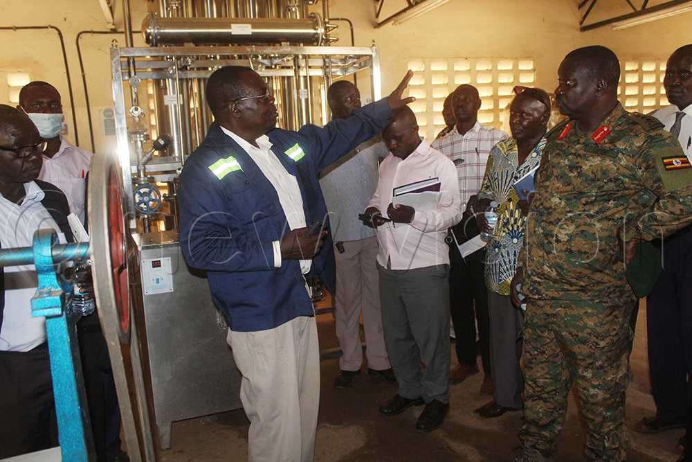 Lt. Gen. Peter Elwelu, senior presidential advisor in charge of monitoring government activities in Teso and Karamoja sub-regions looking on during the inspection of the equipment at Kaberamaido Technical Institute. (Photo by Emmanuel Alomu)