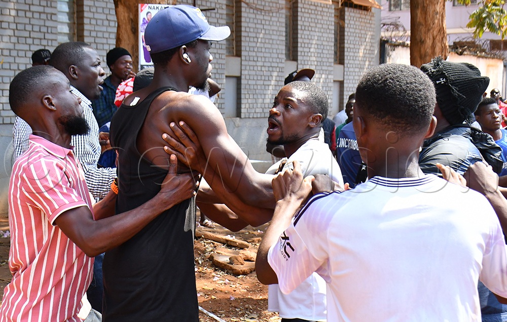 The election supervisor at Iganga Road village was also rescued by police and the UPDF after an angry crowd reportedly started assaulting him. (Credit: Donald Kiirya)