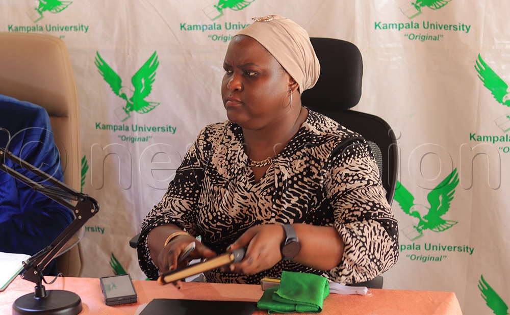 Kampala University Resident Director Rashida Kateregga listens to journalists&rsquo; questions at the university main campus in Ggaba Kampala during a press conference on Monday. (Credit: Douglas Mubiru)
