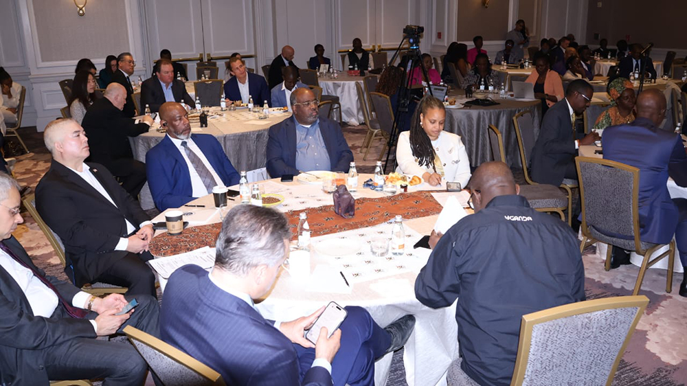 Participants listening to presentations from the Uganda delegation. (Courtesy)