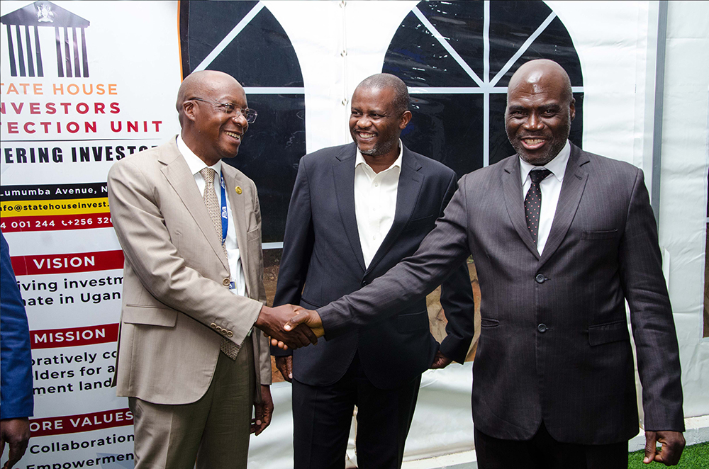 (L-R) Benson Turamye, Executive Director of Public Procurement and Disposal of Public Assets Authority (PPDA), Patrick Birungi, Executive Director Uganda Development Corporation (UDC) and Paul Mwesigwa, Managing Director Uganda Electricity Distribution Company Limited (UEDCL) interacting during the meeting held at State House Investors Protection Unit Offices on Tuesday September 16, 2025. PPU PHOTO