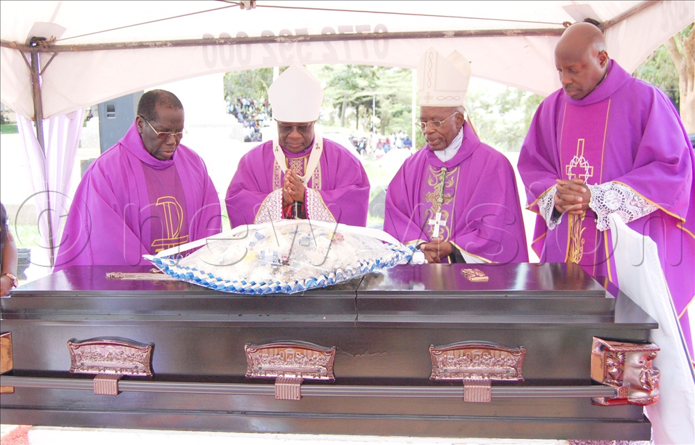 The Catholic prelates, L-R: Msgr. Dr. Richard Kayondo, Archbishop Paul Ssemogerere, Archbishop Dr. Augustine Kasujja and Msgr. Rogers Kabuye Mukasa paying their last respects to Fr. Emmanuel Mukasa  during his Christian burial mass at Kisubi Minor Seminary on Entebbe Road, in Wakiso district on Wednesday, February 4, 2026.  