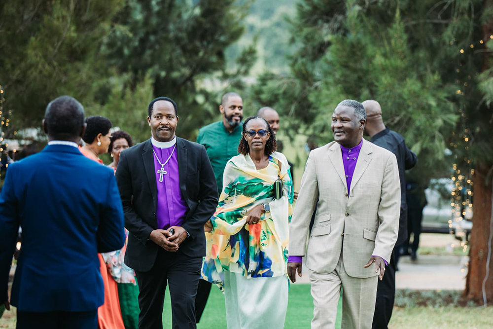 Bishop Joshua Lwere (right) arrives for the event.