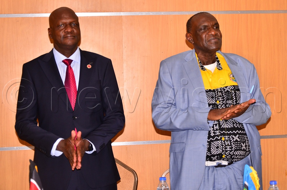 Narenga and Kakande (R) at the official opening of the 14th Kenya-Uganda Joint Border Commission meeting at the Source of Nile hotel in Jinja city on Wednesday. (Credit: Jackie Nambogga)
