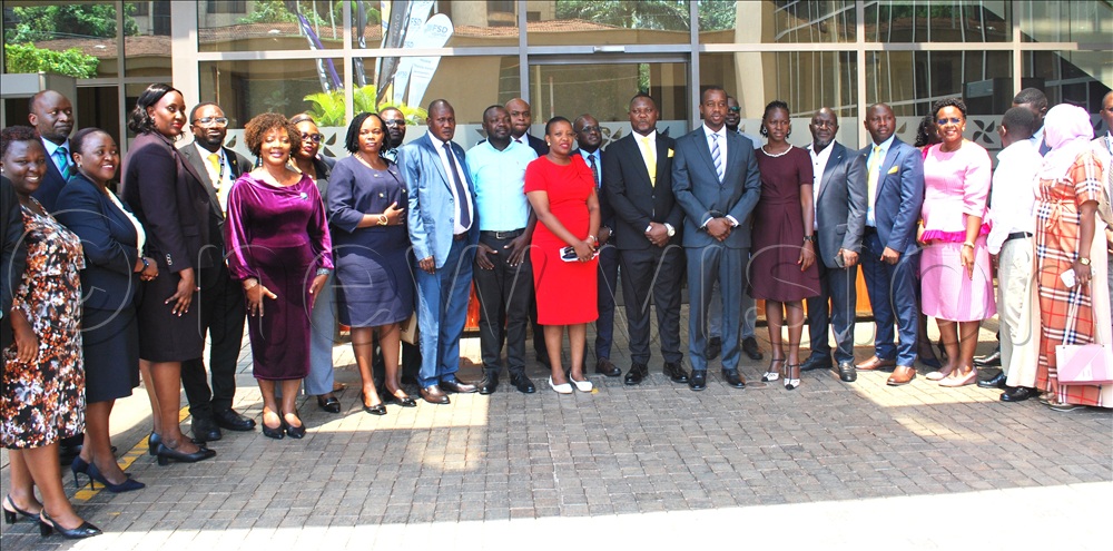 Group photo of members of the parliamentray health committee, civil society health ministers, private sector doctors and care givers of children suffering from sickle cells 