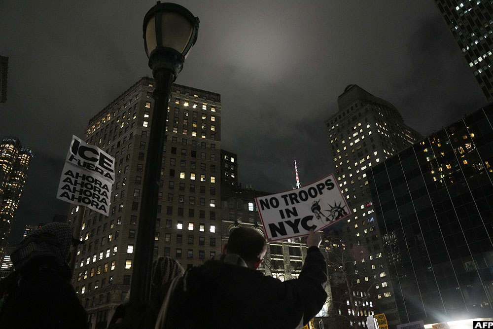 People take part in a protest against Immigration and Customs Enforcement (ICE) in New York on January 7, 2026 after an ICE officer shot dead a woman in Minneapolis.
