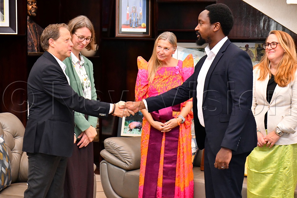 Kyabazinga of Busoga William Gabula Nadiope IV (2nd right) greets Tomas Lundstrom (left), a Counsellor for SRHR at the Swedish Embassy, as Maja Permerup (2nd left), United Nations Population Fund (UNFPA) new Country Representative, Kristine Blokhus (middle) and SIDA’s Multilateral Partner coordinator, Lisa Hedin (right) look on while at his Igenge Palace in Jinja City on Monday. (Photo by Donald Kiirya)