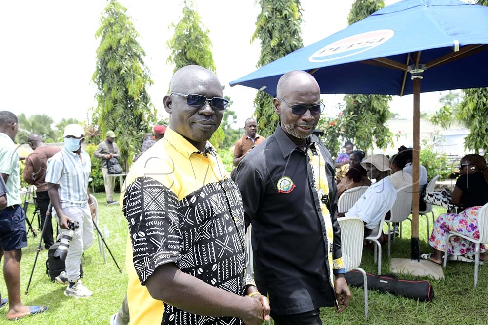 Government Chief Whip, Hamson Obua, right, with Arua City NRM flag bearer, Jackson Atima, at Hotel la Confidential. (Credit: Eddie Ssejjoba)