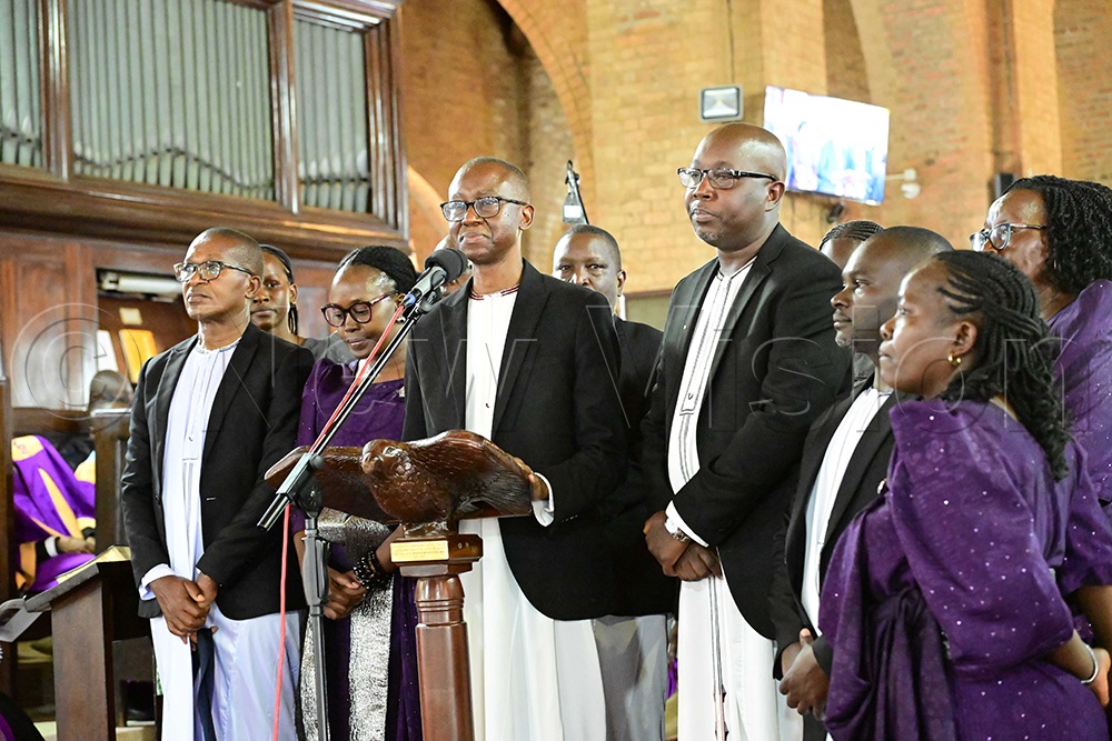 Some of the children of the late Bishop Christopher Ssenyonjo, led by Peter Kyambadde (centre), pay tribute to their father during the funeral service at Namirembe Cathedral on July 24, 2026. (Credit: Eddie Ssejjoba)