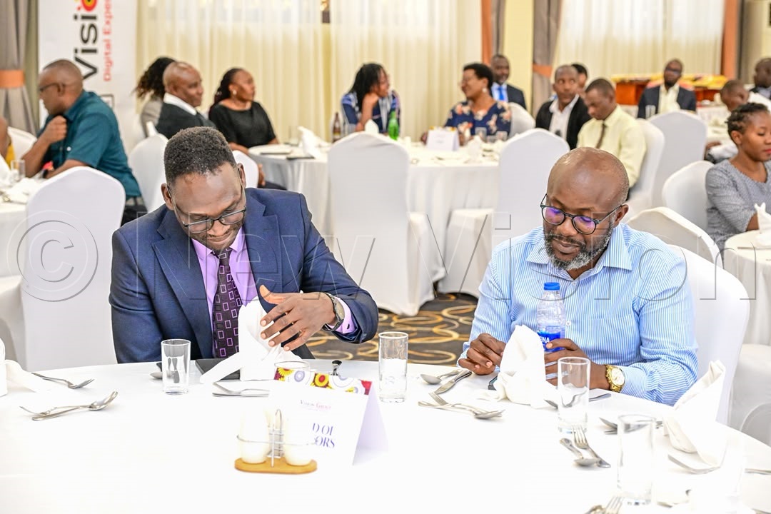 Vision Group CEO, Don Wanyama (right) with the incoming Vision Group Chief Editor, Sidney Miria Babanga (left). 