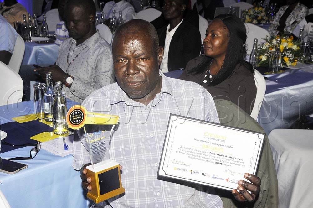 Sam Opio was awarded the Print Media Gold Award for outstanding performance and unwavering commitment to reporting on gender equality, WASH, and reproductive health rights under the Share project on October 16, 2025. (Credit: Wilfred Sanya)
