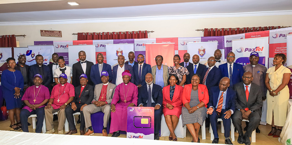 Members of the Clergy, Bishops and Staff of Paxtel Telecom pose for a group photo with the Archbishop of Uganda, Rt Rev. Stephen Kazimba Mugalu. (Courtesy)