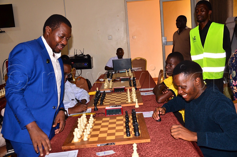 Abbey Mawerere, the Eastern Uganda Chess Tournament president (L), while flagging off the 2026 Eastern Uganda region chess tournament which drew 326 players at the Source of the Nile Hotel in Jinja city. (Photo by Jackie Nambogga)