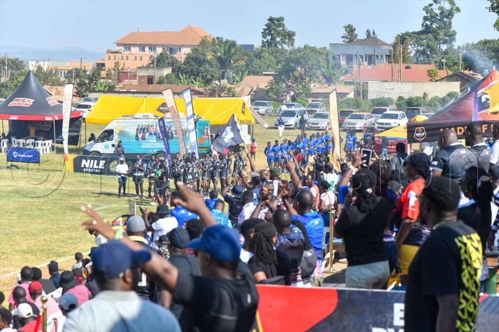 Heathens and pirates players running onto the pitch