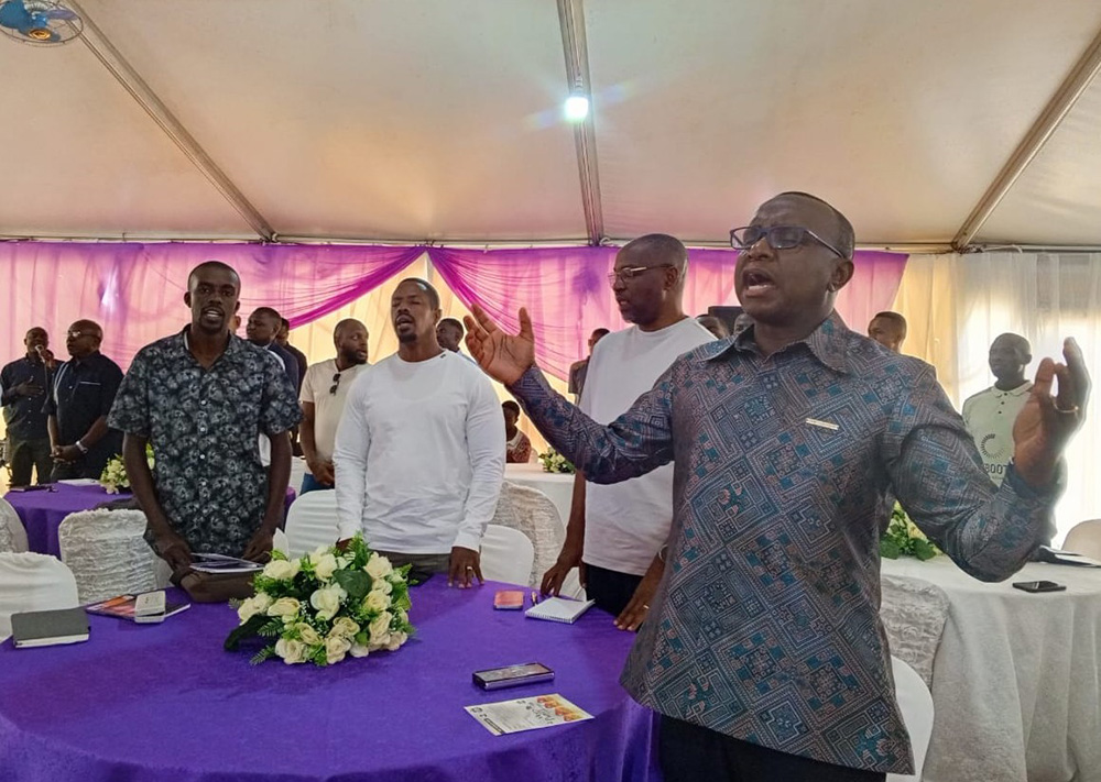 Men at All Saints Cathedral Nakasero in Kampala participating in a prayer moment during launch of Men's Prayer Conference to be hosted in August. (Photo by Nelson Kiva)