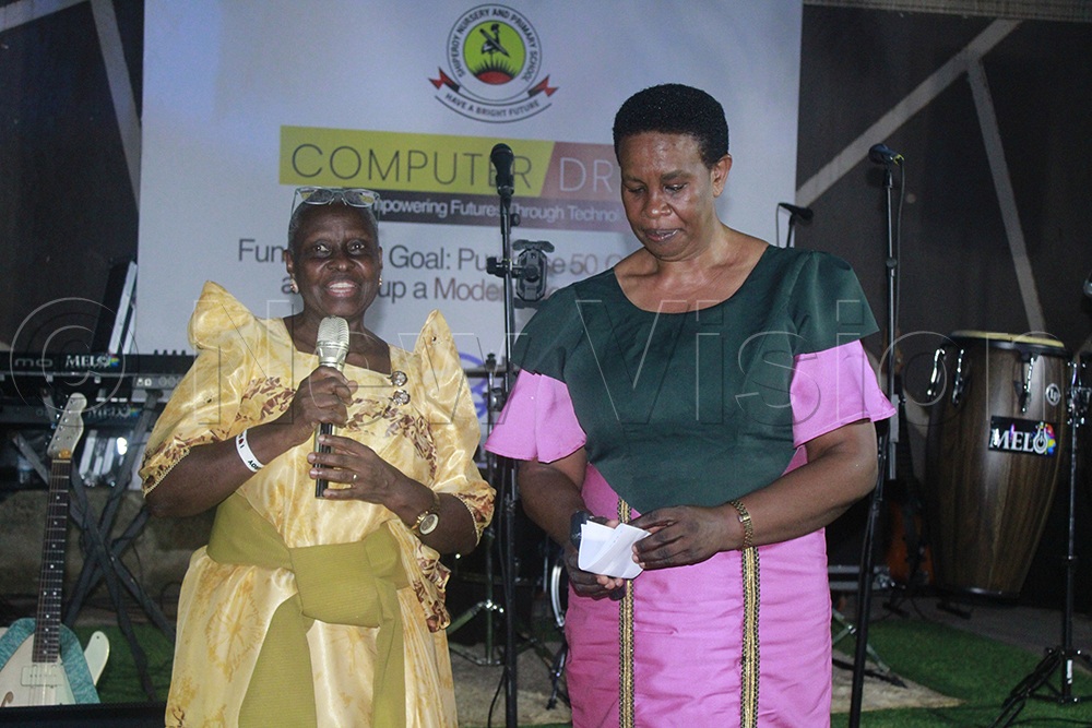 Anne Munywevu (R), who was the chief guest, delivered her speech, besides Mable Kalinzi Ssemuju, who started the school in 1997 to provide affordable education to vulnerable children. (Credit: Ritah Mukasa)