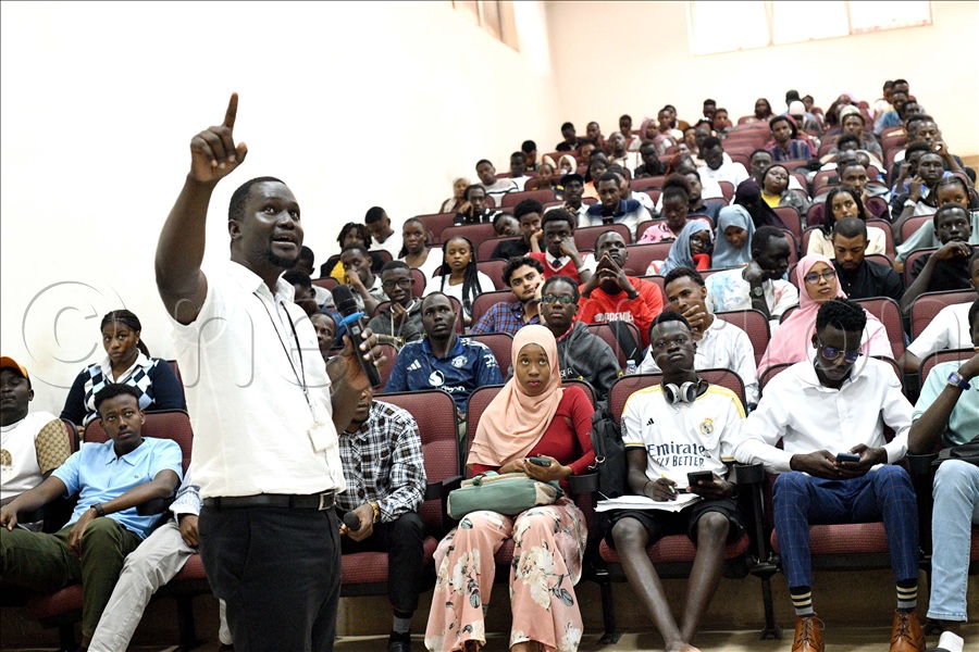 International University of East Africa students listen to Vision Group's Max Adii during the ultimate university quiz challenge orientation at Kansanga in Kampala. (Credit: Maria Wamala)