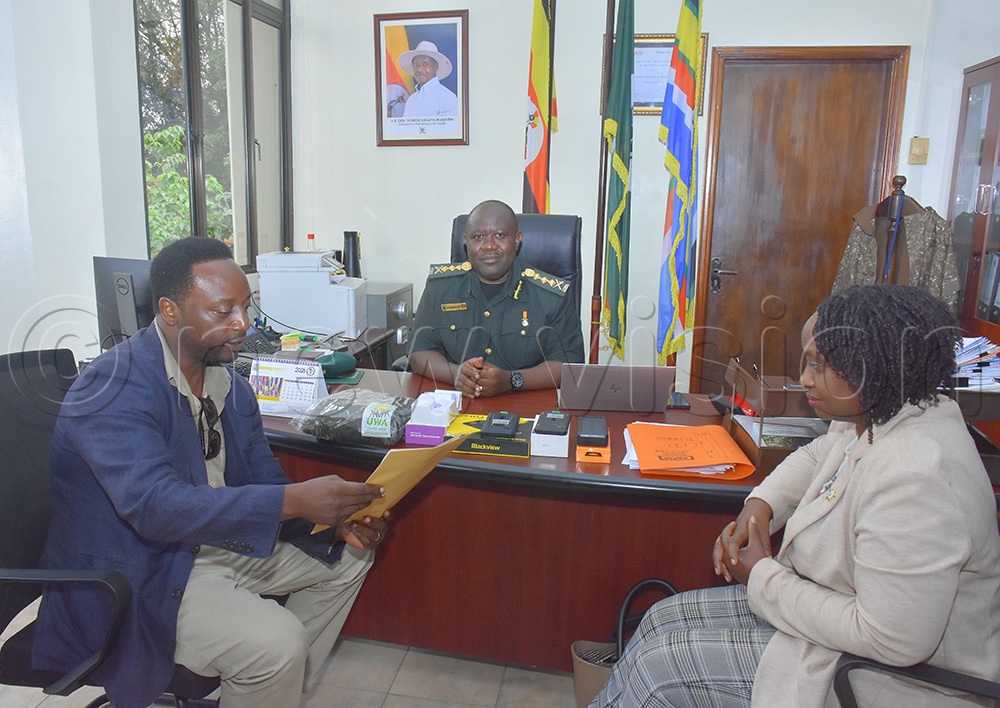 Dr Gladys Kalema and Lawrence Zikusoka, the CTPH director meeting Dr James Musinguzi, the UWA executive director before handing over a donation worth sh113m of protective gear for the wellbeing of UWA rangers and the apes they protect. (Photo by Julius Luwemba)