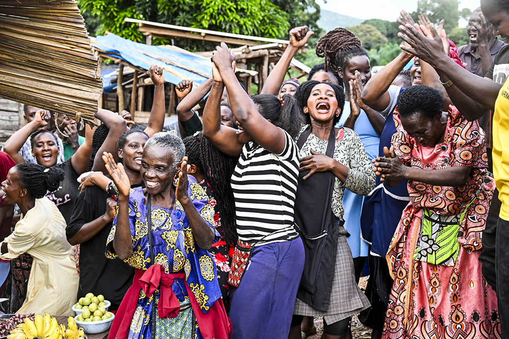 Lunya roadside Market jubilate after hearing that President Yoweri Kaguta Museveni has given them financial support to market Vendors at Lunya roadside Market in Kiboga District on September 16, 2025. (Photo by PPU)