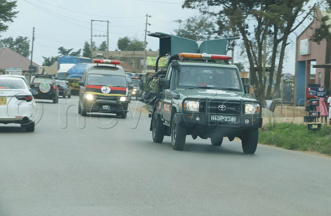 A motorcade transporting Gen. Elly Tumwine's remains heads to his home in Nakasero from Bombo. Photo by Alfred Ochwo