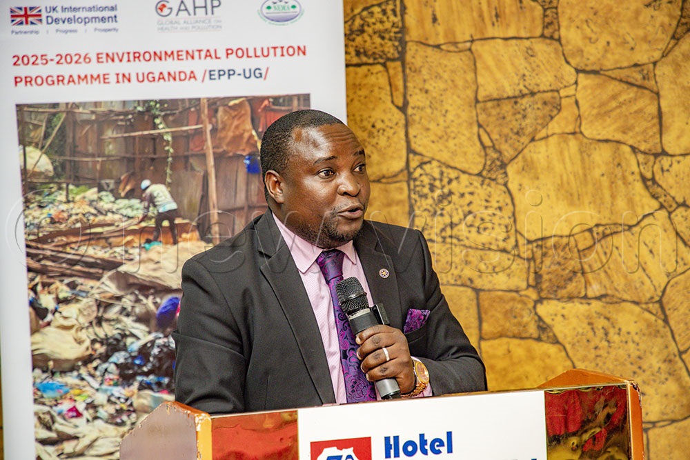 The board chairperson Global Alliance on Health and Pollution (GAHP) Raymond Ruyoka addressing participants during the EPP conference at Hotel Africana. (Photo by Agnes Kyotalengerire)