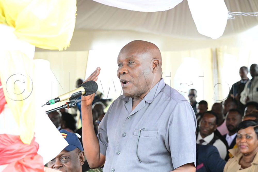 Sidronius Opolot Okasai, the State Minister for Energy and Mineral Development (Energy), responds to President Museveni's queries over the ministry's failure to provide adequate electricity supply to the investor. (Credit: Eddie Ssejjoba)