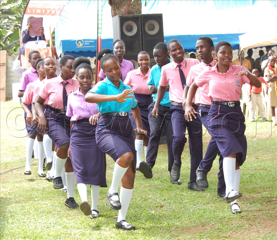 The students from God's Way High School Maganjo perform a liturgical dance during mass.