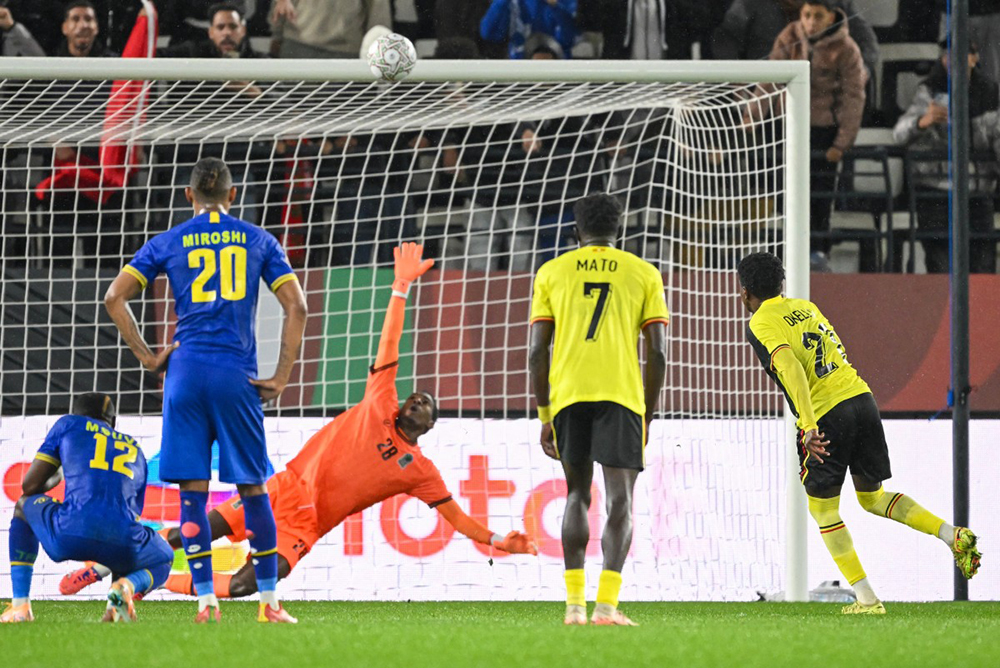 Uganda's midfielder #21 Allan Okello misses a penalty during the Africa Cup of Nations (CAN) Group C football match between Uganda and Tanzania at Al Medina Stadium in Rabat on December 27, 2025. (Photo by SEBASTIEN BOZON / AFP)