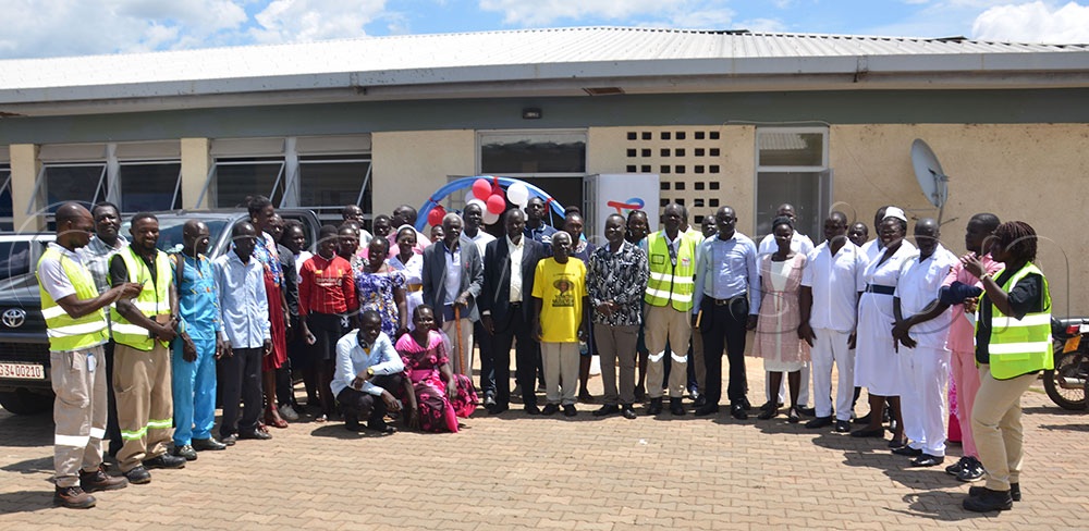 Total Energies Uganda staff, Engineers Without Borders East Africa, District and Anaka Hospital staff during the handover of water infrastructure. (Credit: Jackson Kitara)