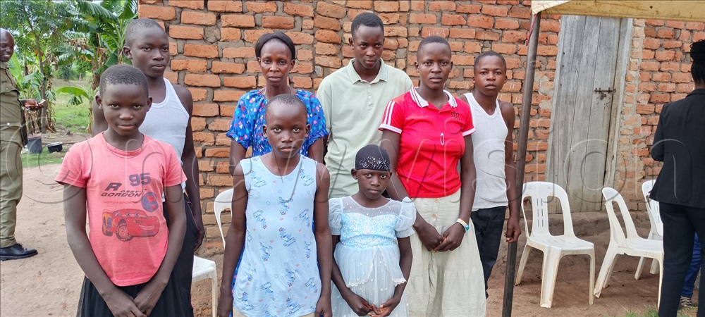 Madina Baluka (in blue) with her seven children