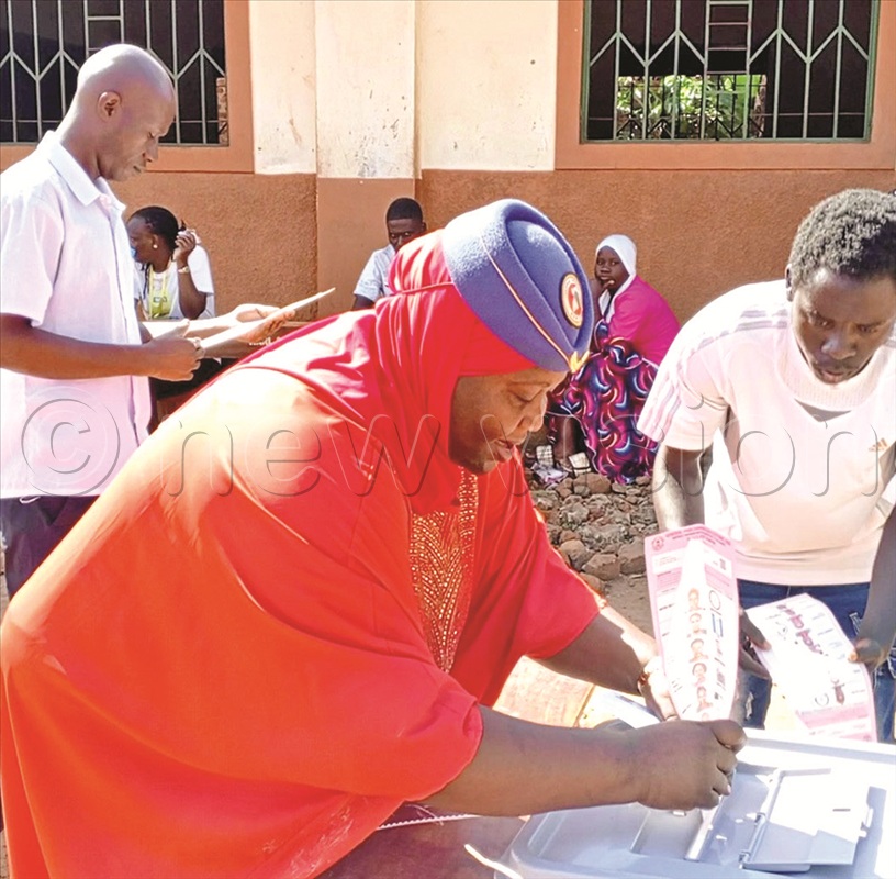 NUP woman parliamentary candidate for Mbale city Aisha  Nakayenze casting her vote at Najja polling station in Nakaloke.
